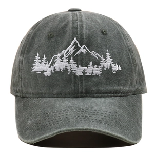 Close-up of mountain and forest embroidery on washed cotton charcoal grey baseball cap