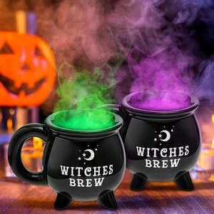 Ceramic witches brew cauldron mugs with moon and star patterns for Halloween decor