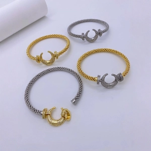18K gold and silver moon bracelets with pavé zircons and woven metal texture style