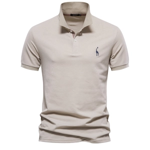 Close-up of small giraffe embroidery on beige cotton piqué polo shirt for men