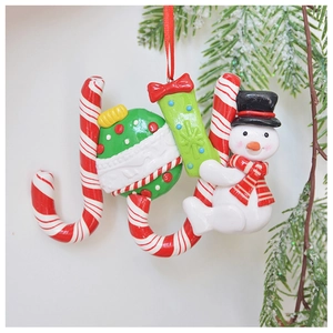 Christmas tree ornament featuring a snowman and candy canes forming the word JOY
