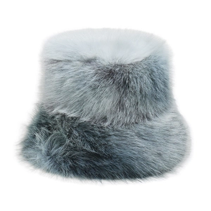 Detail of gray and white faux fur bucket hat with soft plush texture for winter