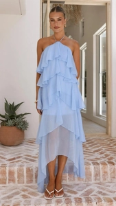 Full view of light blue halter chiffon dress with tiered ruffles and layered hem