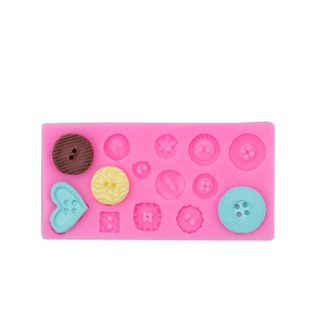 Pink silicone button mold for fondant and resin featuring various shapes on white background