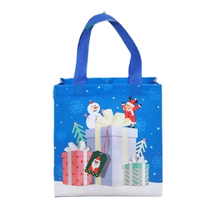 Blue non-woven Christmas gift bag with cartoon snowman and reindeer festive prints