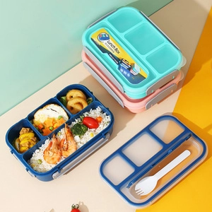 Three multi-compartment lunch boxes in blue and pink with clear lids and utensils