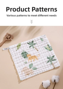 Close-up of 100% cotton baby gauze towel with cartoon jungle animal prints and texture