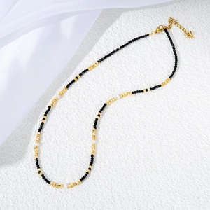 Elegant 18k gold plated stainless steel necklace with black spinel beads and pearls