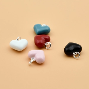 925 sterling silver heart-shaped enamel pendants in five vibrant colors with metal rings