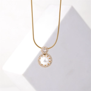Elegant gold double ring necklace featuring a center pearl and sparkling zircon accents