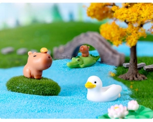Detailed scene of Capybara miniature figures with crocodile and lotus in micro landscape