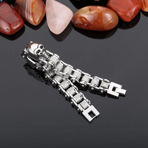 Macro detail of gothic skull biker chain bracelet in polished stainless steel