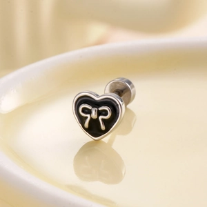 Titanium steel heart stud earring with black enamel and silver bow detail for women