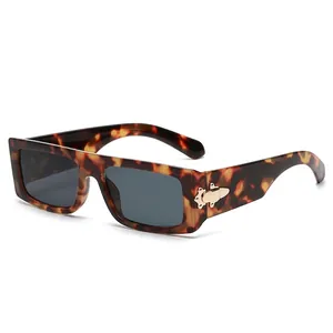 Vintage rectangle tortoiseshell sunglasses with grey lenses and gold hardware
