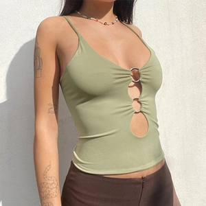 Close-up of grass green slim-fit camisole featuring three silver metal rings with cutouts
