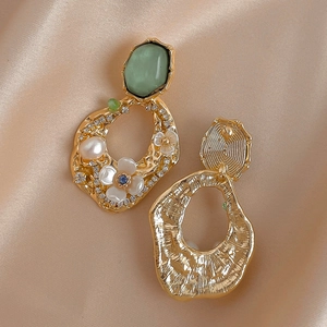 Vintage floral drop earrings with pearls and turquoise stones on champagne silk