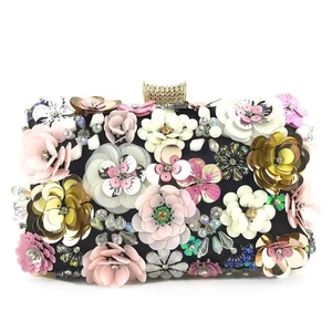 Elegant black evening clutch bag with 3D floral decorations and sparkling sequins