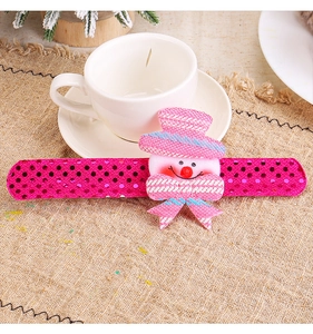 Close-up of pink sequined snowman slap bracelet for kids Christmas gifts