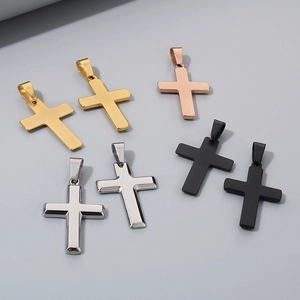 Cross pendants in gold, silver, black, and rose gold finish with polished metal texture