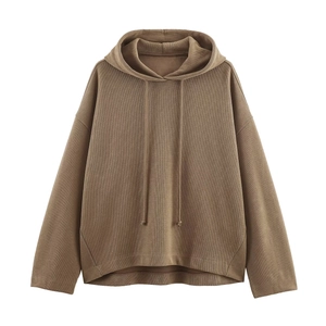 Detailed texture of brown ribbed fabric on a long sleeve drop-shoulder hoodie set