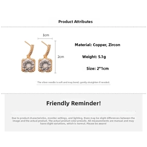 Detail showing 18k gold plated square stud earrings with zircons and silver needle pins