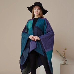 Women's reversible plaid knit poncho shawl with colorful geometric patchwork design