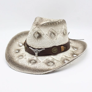 Hollow-out cowboy straw hat with silver bull head ornament and wide brim for summer