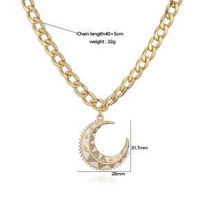 Exaggerated golden link chain necklace with white enamel moon pendant and crystals