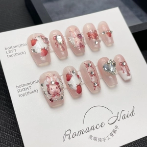 Pink jelly press-on nails set with strawberry bunny motifs and luxury heart rhinestones