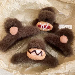 Cute brown plush shark hair clips with acrylic croissant and pompom designs