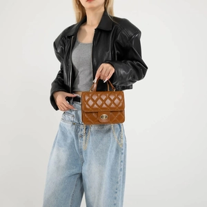 Classic brown quilted leather chain shoulder bag for women in a stylish vintage design