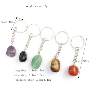 Five assorted natural irregular crystal stone keychains with polished gemstone pendants