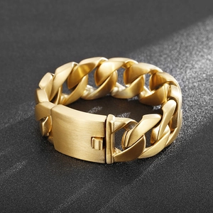 Close-up of 18k gold plated stainless steel chunky Cuban chain bracelet with matte buckle