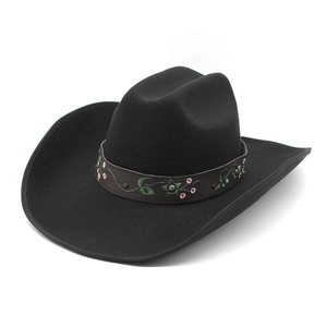 Vintage black felt cowboy hat with floral embroidery and rivets on brown band