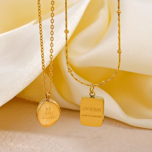 18K gold plated stainless steel geometric necklaces with engraved round and rectangular charms