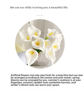 Close-up of white artificial Calla Lily flowers with yellow centers and green stems