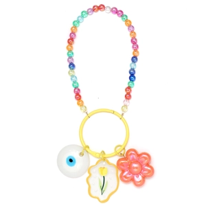 Detail of colorful beaded keychain with evil eye charm and tulip pendant on white background