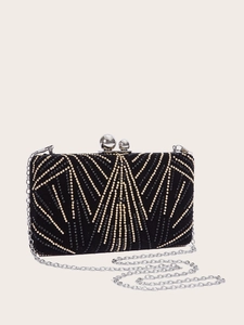Black Art Deco evening clutch bag with gold bead radiation pattern and silver chain