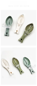 Detail of fish-shaped scale scrapers with protective lids in three Morandi colors