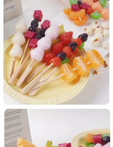 Macro detail of artificial candied fruit skewers with realistic texture and vibrant colors