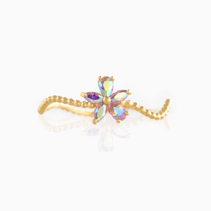 Macro shot of gold flower ring with iridescent pear-cut crystals and beaded wavy band