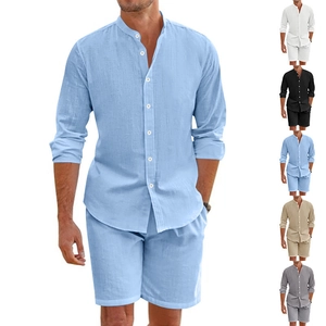 Detail of light blue linen shirt and drawstring shorts set with multiple color swatches