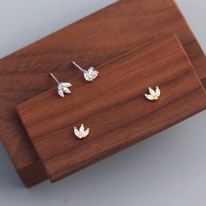 Detailed view of silver and gold S925 sterling silver marquise crown stud earrings