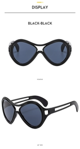 Front and 45-degree side views of black oversized fashion sunglasses in a modern layout