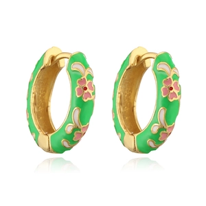 Detailed view of 18K gold-plated hoops with green enamel and pink floral patterns