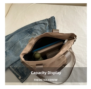 Interior view showing large capacity for tablet and daily items in nylon tote bag
