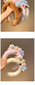 Close-up of soft plush cartoon headbands in brown, pink, white and blue colors