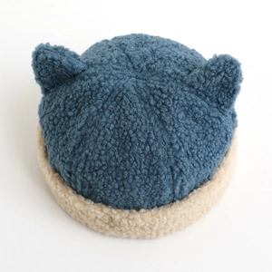 Winter baby beanie with cute ears in dark blue corduroy and white fleece trim