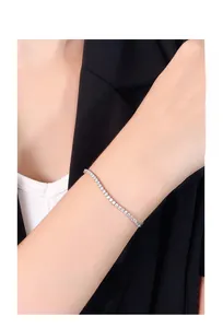 Close-up of S925 sterling silver square tennis bracelet with sparkling zircons on wrist