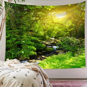 Detailed view of forest scenery tapestry hanging in a minimalist bedroom setting